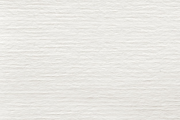 A white plain wallpaper with a textured background.