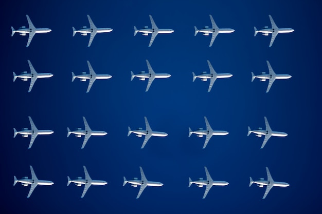 White planes in blue sky pattern