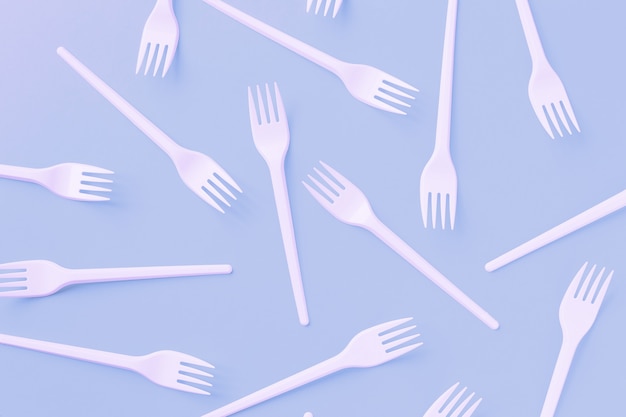 White plastic forks, top view