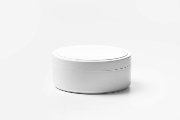 White plastic jar for cosmetic products for face and body skin care hair isolated on a white background Packaging layout for cream masks scrub Containers for hygiene products