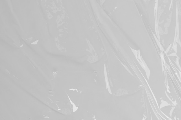 Фото Текстура белого пластикового или полиэтиленового мешка прозрачный морщинистый пластиковый макробелый фон