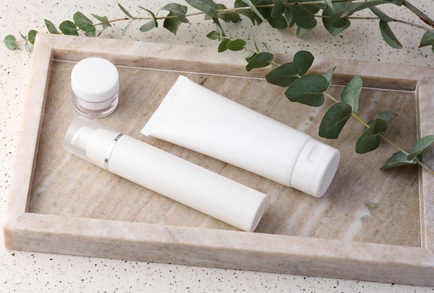 White plastic tube jar for cosmetics Container for gel cream tonic Advertising and product promotion