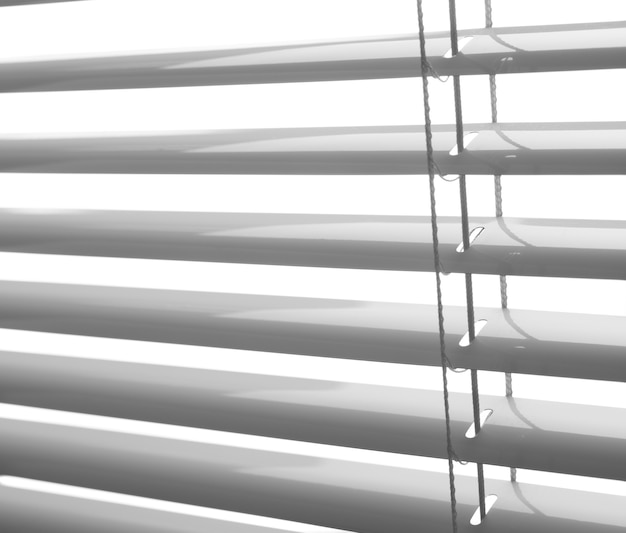 White plastic window blinds close studio shot