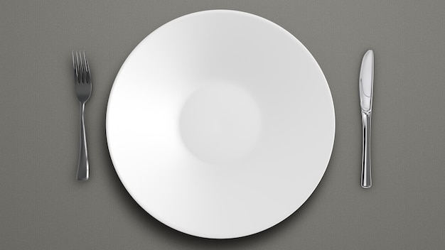 White plate fork and knife on the table