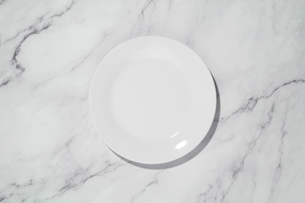 White plate on a gray background