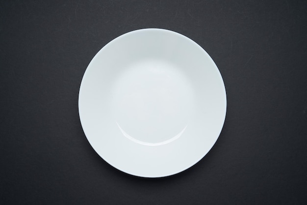 White plate isolated on black background