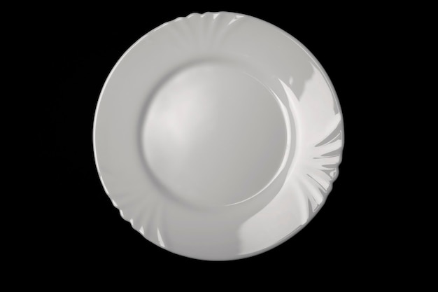 White Plate isolated on black background