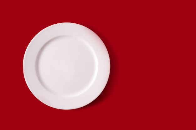 White plate on red