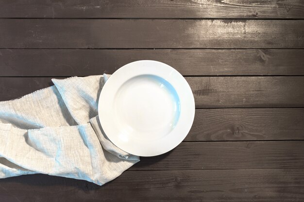 White Plate on a Tablecloth