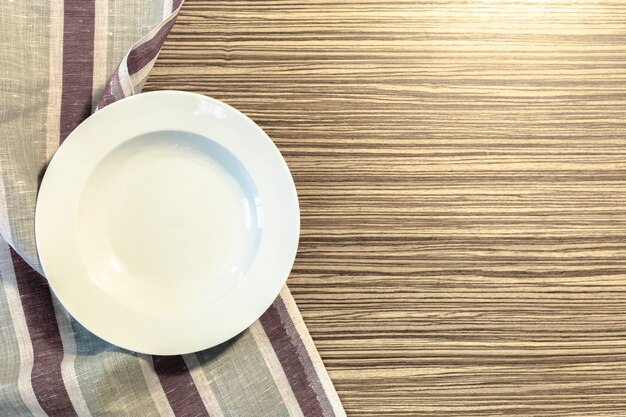 White Plate on a Tablecloth