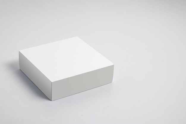 Photo white podium on white background. perfect platform for showing your prod