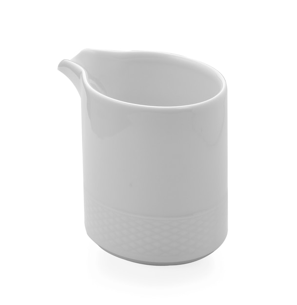 Photo white porcelain jar on white surface