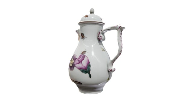 A white porcelain jug with a floral design on the lid.