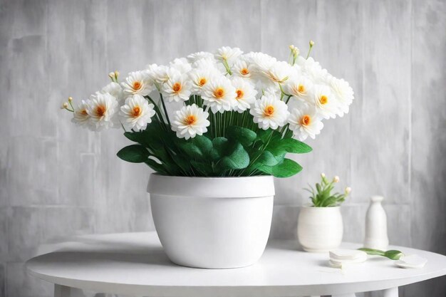 a white pot with white flowers and green leaves