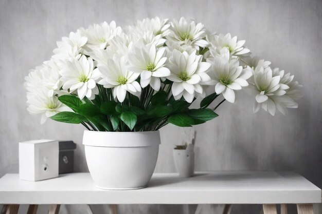 a white pot with white flowers on a shelf and a phone on the side