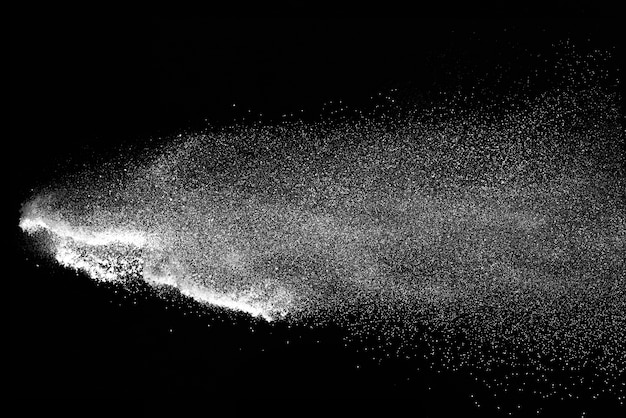 White powder explosion on black background.