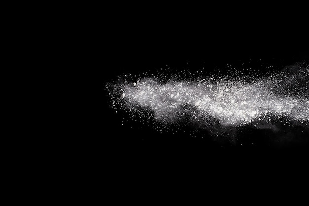 White powder explosion on black background.  