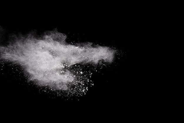 White powder explosion on black background.  