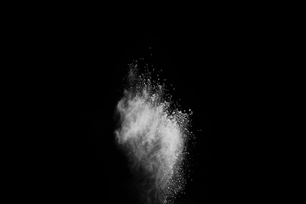 White powder explosion on black background.  