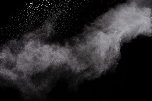 White powder explosion on black background.  