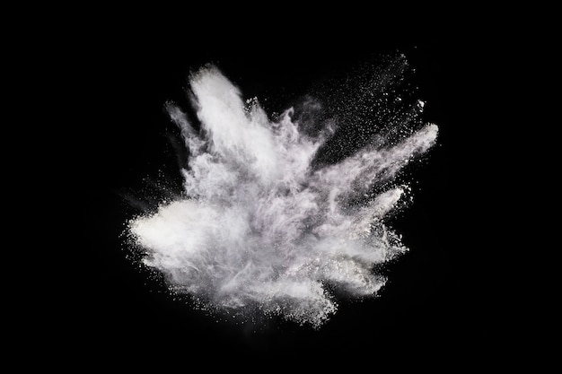 White powder explosion on black background.  