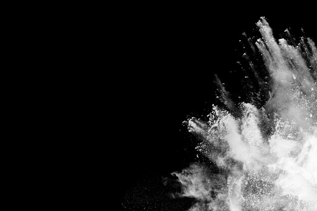 White powder explosion on black background.