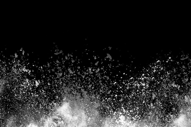 White powder explosion on black background.