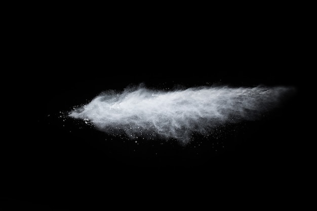 White powder explosion on black background