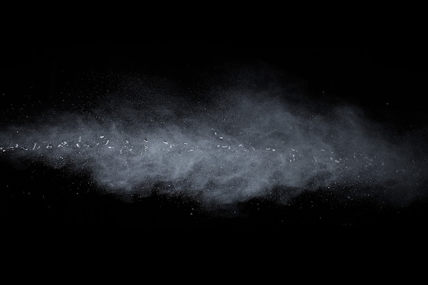 White powder explosion on black background