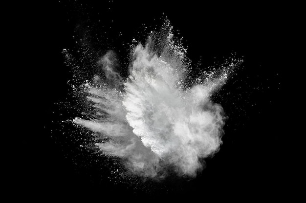 Photo white powder explosion on black background