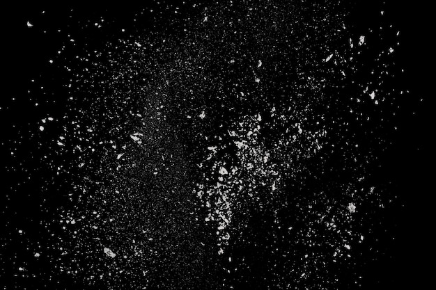 Photo white powder explosion on black background