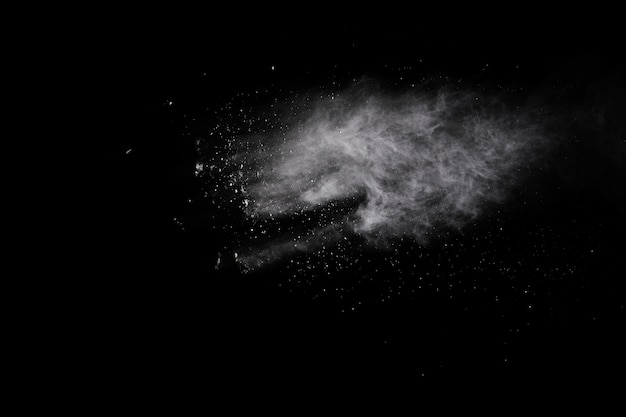 White powder explosion on black background. 