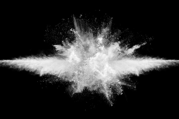 Photo white powder explosion on black.