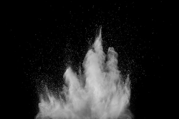 white powder explosion cloud against black background.White dust particles splash.