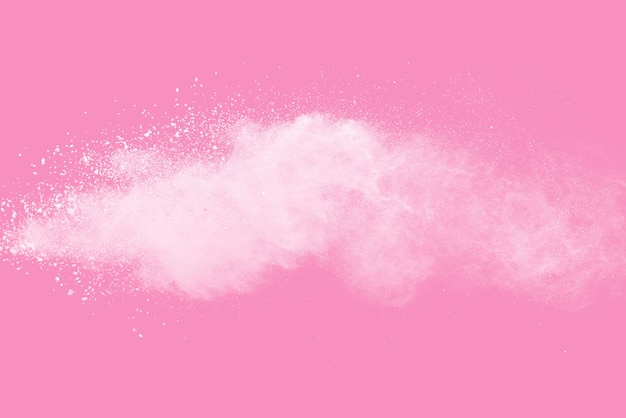 White powder explosion on pink background