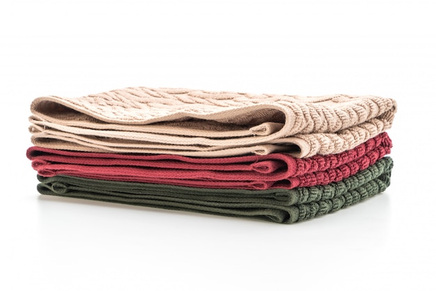 white, red and white towels on white