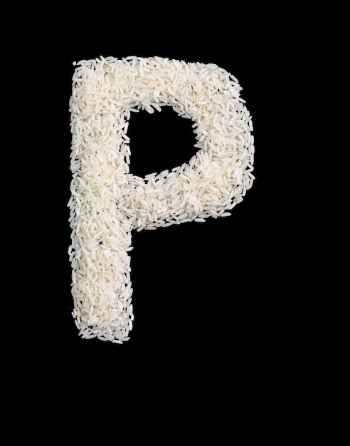 White rice grain alphabet letter