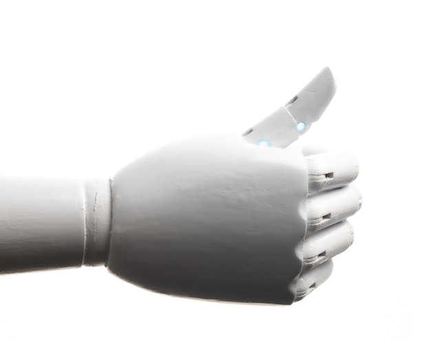 Foto pollice bianco della mano del robot su isolato su fondo bianco