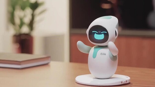 a white robot with the word  t  on it