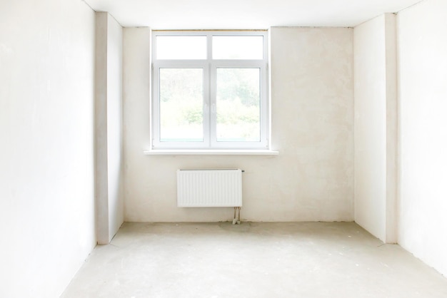 White room with window Empty interior space