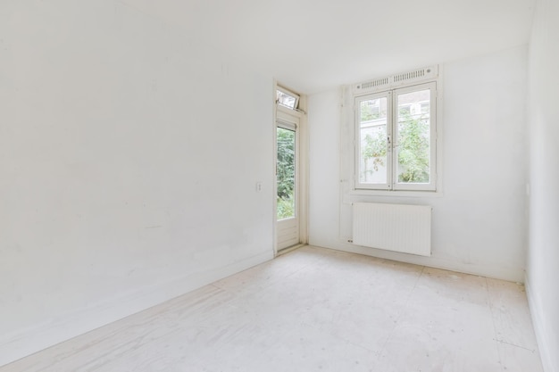 White room with windows in an elegant residential building