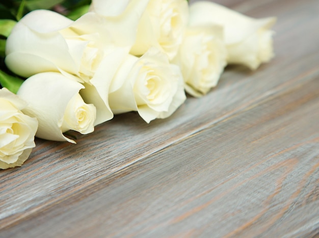 White Rose A bouquet of delicate roses on a white background Place for text closeup Romantic background for spring holidays