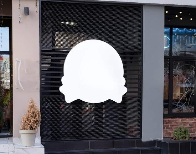 Photo white round logo on building wall exterior for mockup design