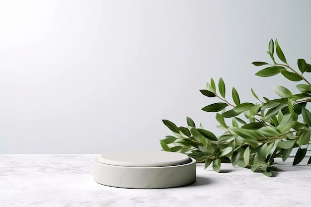 A white round object with a white circle on the top and a green plant next to it.