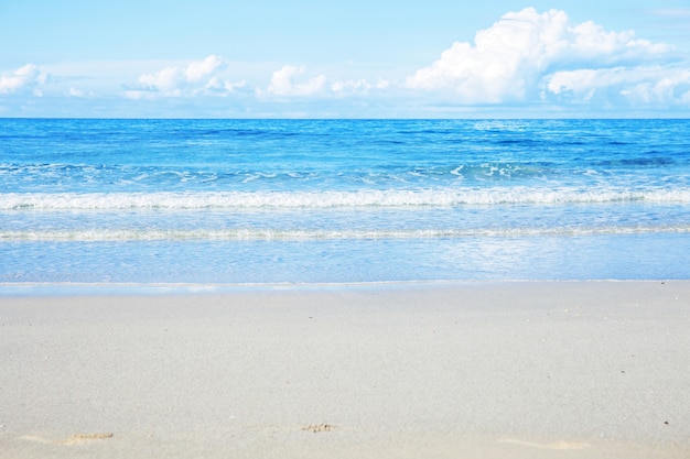 White sand on beach at daytime.