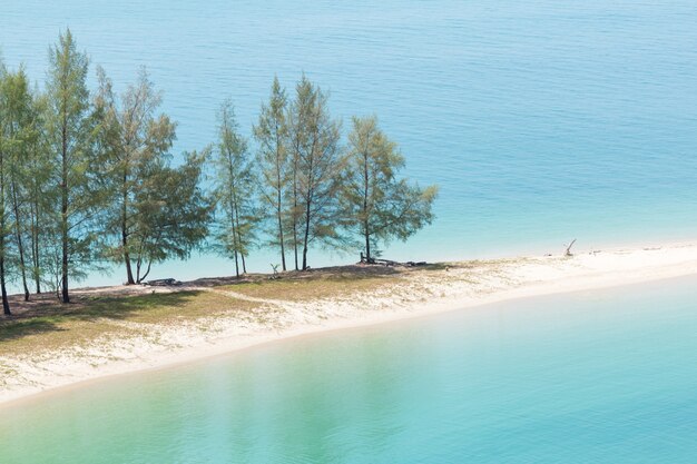 White sand beach and Long-tail boat at Kham-Tok Island (koh-kam-tok), The beautiful sea Ranong Provi