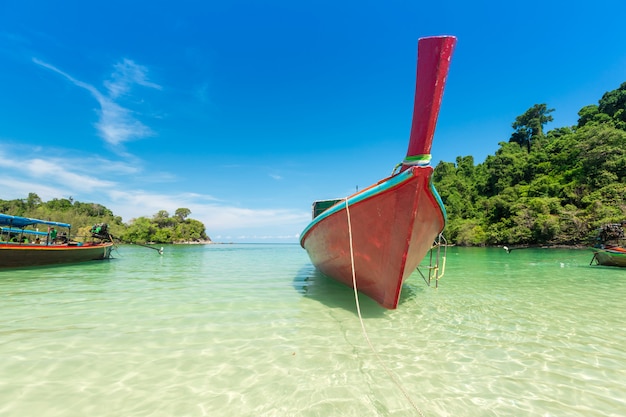 White sand beach and Long-tail boat at Kham-Tok Island (koh-kam-tok)