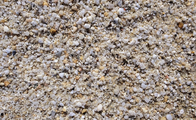 White sand and small pebbles for background