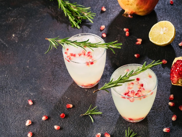 White sangria with rosemary pomegrante and lemon juice