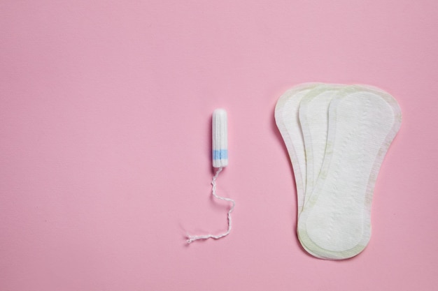 White sanitary cotton pad and feminne tampon